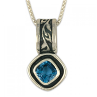 Flores Cushion Pendant in Sterling Silver in Swiss Blue Topaz